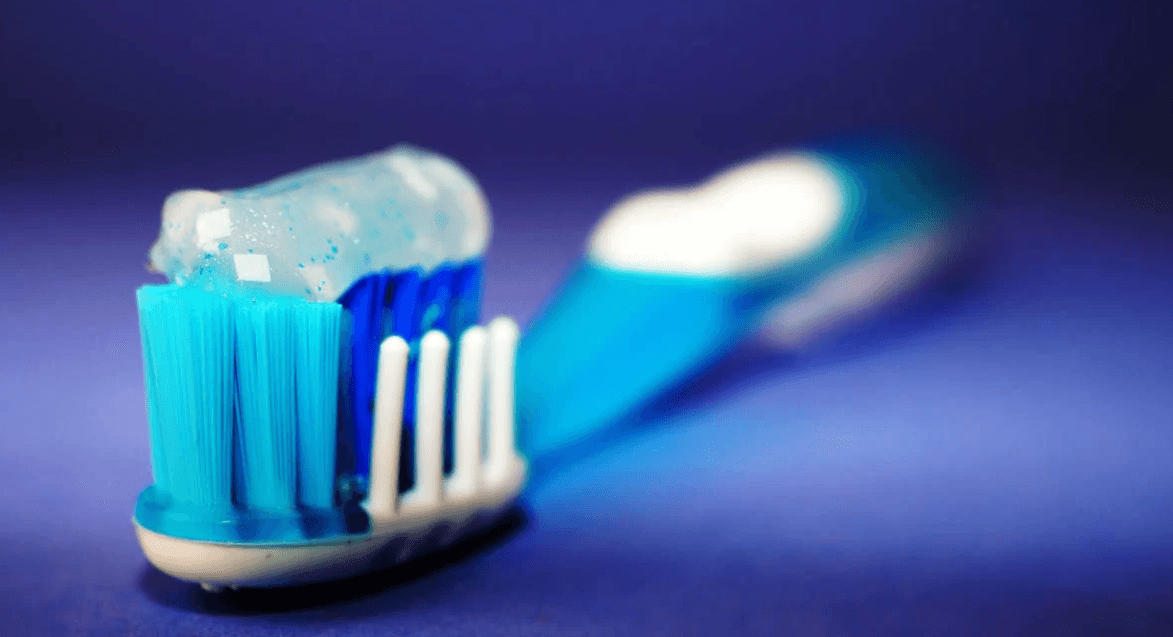 Toothpaste on a toothbrush